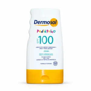 Frasco blanco y amarillo de crema fotoprotectora pediátrica Dermosol SPF 100, con etiqueta que indica protección UVA y UVB y ausencia de parabenos, oxibenzona y Paraffinum Liquidum.